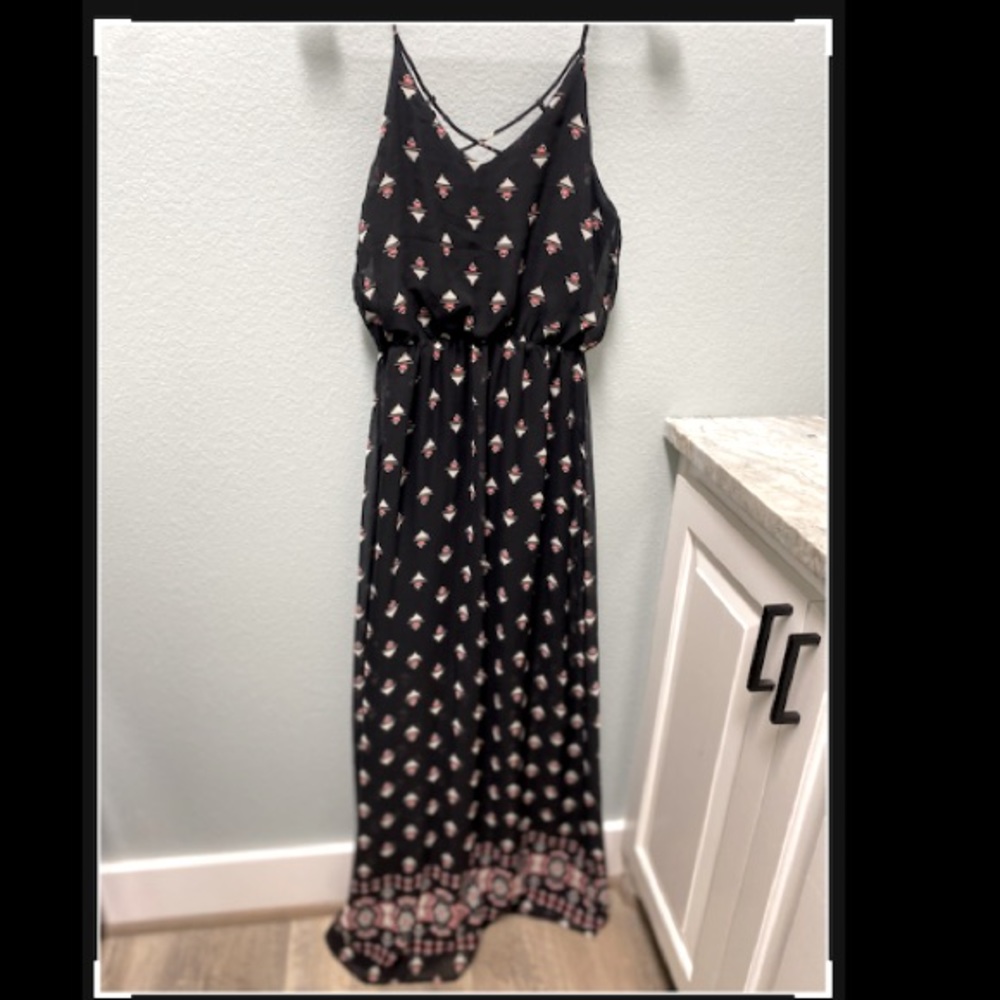 Sienna Sky black maxi dress. Size small. Sheer bottom.